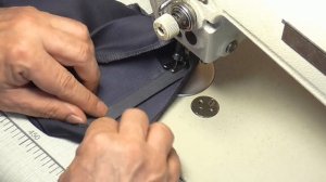 подшивка низа классических мужских брюк с брючной лентой