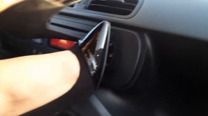Calypso torturing and revving a Fiat Panda in leggings and high heels