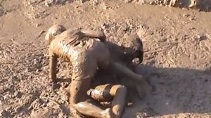 FLAG GIRL MUD WRESTLING