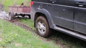 Уаз Патриот с прицепом и лужа