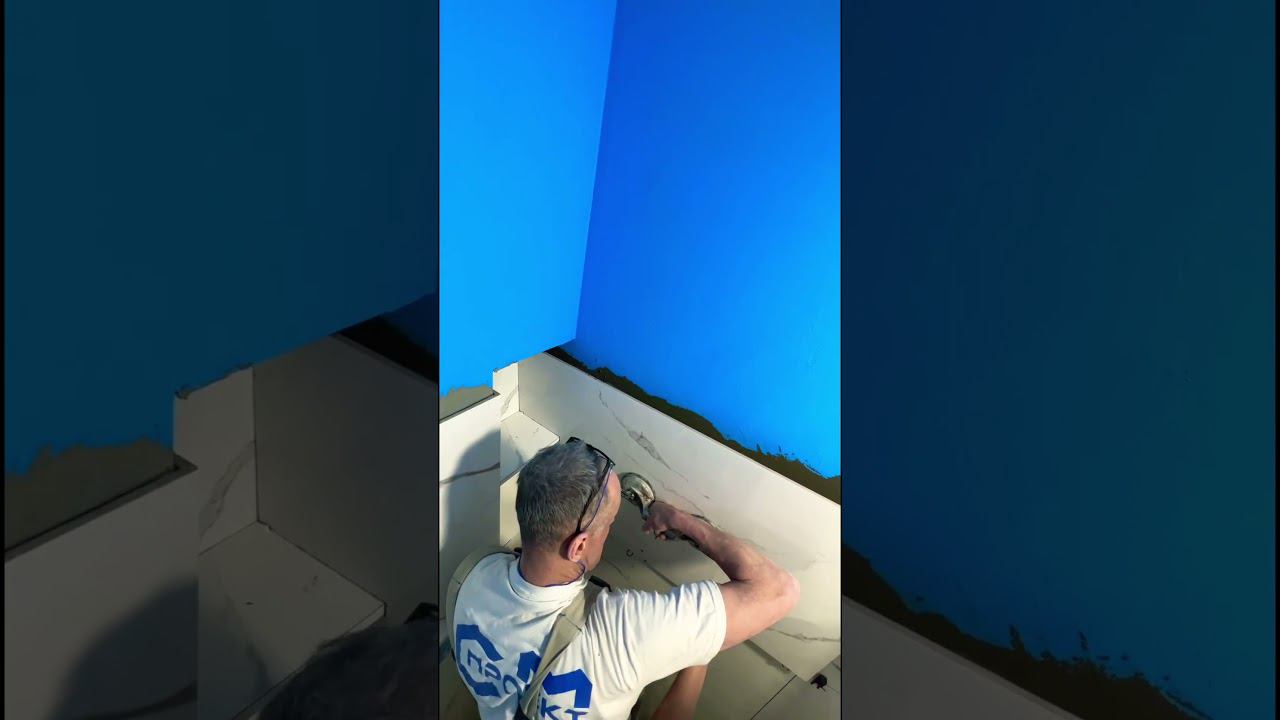 Облицовка стен крупноформатным керамогранитом с тонкой подрезкой в нише полочек смотреть онлайн