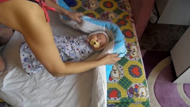 Как завернуть ребенка в одеяло