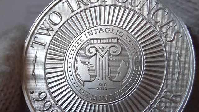 Серебряный раунд 2 унции(62,2гр.),Жук Скарабей,проба 999.