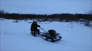 Мотобуксировщик Ахтар с усиленой гусеницей по сырому снегу