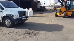 Hyundai H940s погрузка фронтальным погрузчиком Биг-Бэгов с нитроамофоской