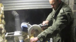 Metabo Electra Beckum KGS 303 Radial Mitre Saw cutting firewood