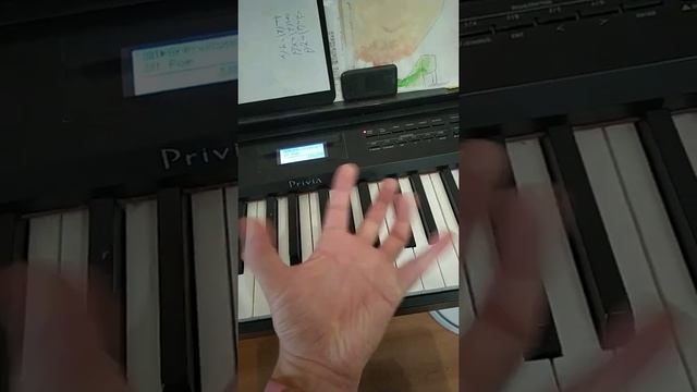 как одной рукой взять октаву на пианино