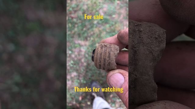 Metal Detecting: Is it an old fuse or bulb? The world may never know.