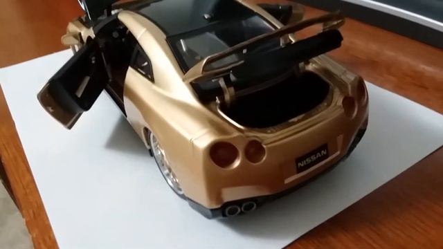 Nissan gtr coustom 1/18 burago смотреть онлайн