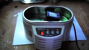 Чистка картриджа от принтера в ультразвуковой ванне.