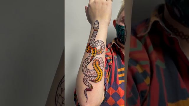 Snake design hand tattoo