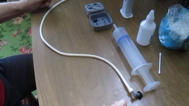 Способы удалить серную ушную пробку.