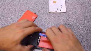 Распаковка и замена аккумулятора на oneplus one BLP571