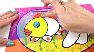 Картина из пластилина. Раскрашиваем золотую рыбку. Picture of clay. Coloring goldfish.