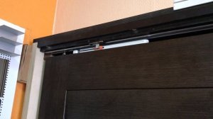 Работа доводчика для подвесной двери