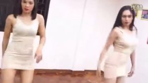 Две китаянки танцуют в коротких платьях на высоких каблуках