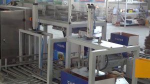 Автоматическая укладка упакованного продукта в короба