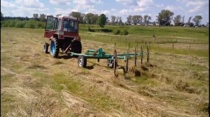 Грабли солнышко, ворошение сена.