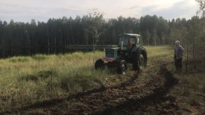Трактор т 40  в болоте на замедленной передачи