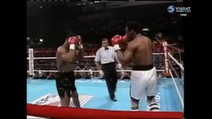 35. Майк Тайсон - Майкл Спинкс