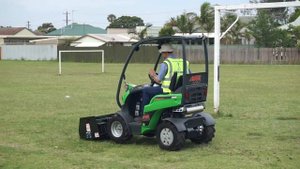 Avant 225 mini loader with Avant Lawn Aerator Attachment