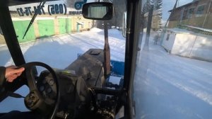 Работа универсального отвала на тракторе МТЗ-82.1. Чистим дороги.