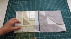 Лоскутное одеяло из грустных лоскутков в серых тонах.