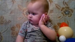 Важный разговор по телефону малыша