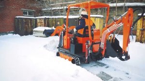 Мини экскаватор-погрузчик STRONG MS 6000. Роторный снегоуборщик. Погрузка.