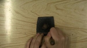 Плетеный кожаный браслет с пряжкой.