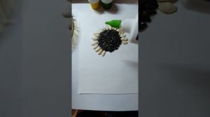 Подсолнух из семечек?