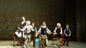 На задней парте.