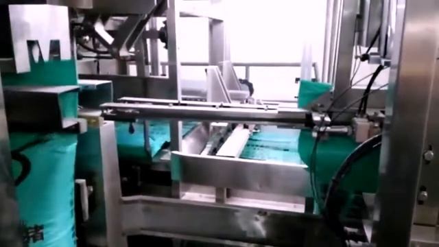 Автоматическая линия для упаковки в мешки и паллетирования/Automatic bagging machine. Palletising