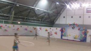 Групповое выступление гимнасток Звездного городка с обручем
