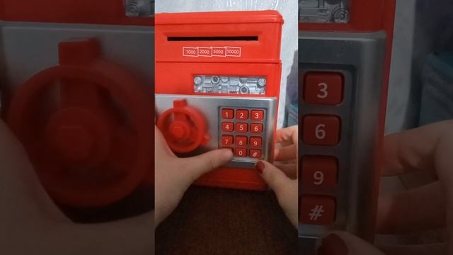 как поменять пароль на сейфе копилка