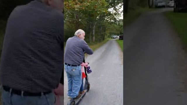 dad riding the Segway ninebot max