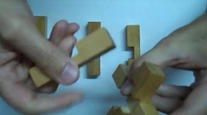 solution to reassemble wooden cross puzzle mind game