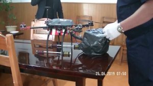 Сотрудники тавдинской колонии приземлили квадрокоптер с мобильными подарками для осужденных