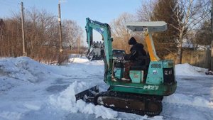 уборка снега мини экскаватор
