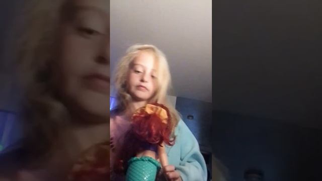 brushing Ariel's hair