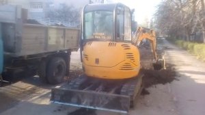 Погрузка миниэкскаватором JCB