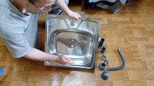 Как собрать сифон с широкой горловиной и переливом для кухни в домашних условиях.