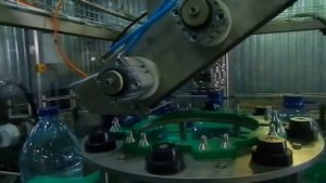 Аппликатор одевания ручек на ПЭТ-бутыли