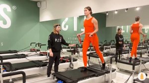 Back Elevator Lunge with Red Straps (Front Facing) | PLTS Individual | Reformer Pilates