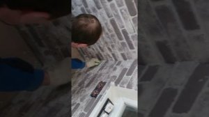 Отделка балкона клинкерной плиткой.