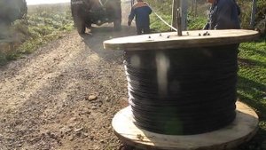 Раскрутка кабеля СИП2а с катушки