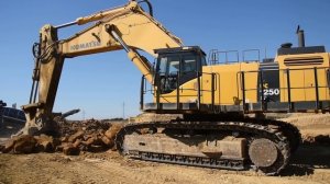 Komatsu PC1250 loading HM400