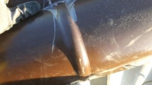 Полукруглый стальной конек на вальмовой крыше из шифера