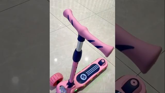 Scooter with lights and music - playmaster toys