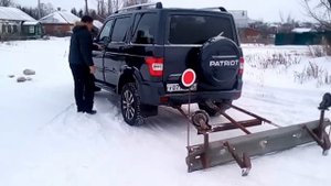 Чистим снег на Уазе Патриот. Елец.